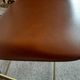 Chaise pliante structure tube et simili cuir