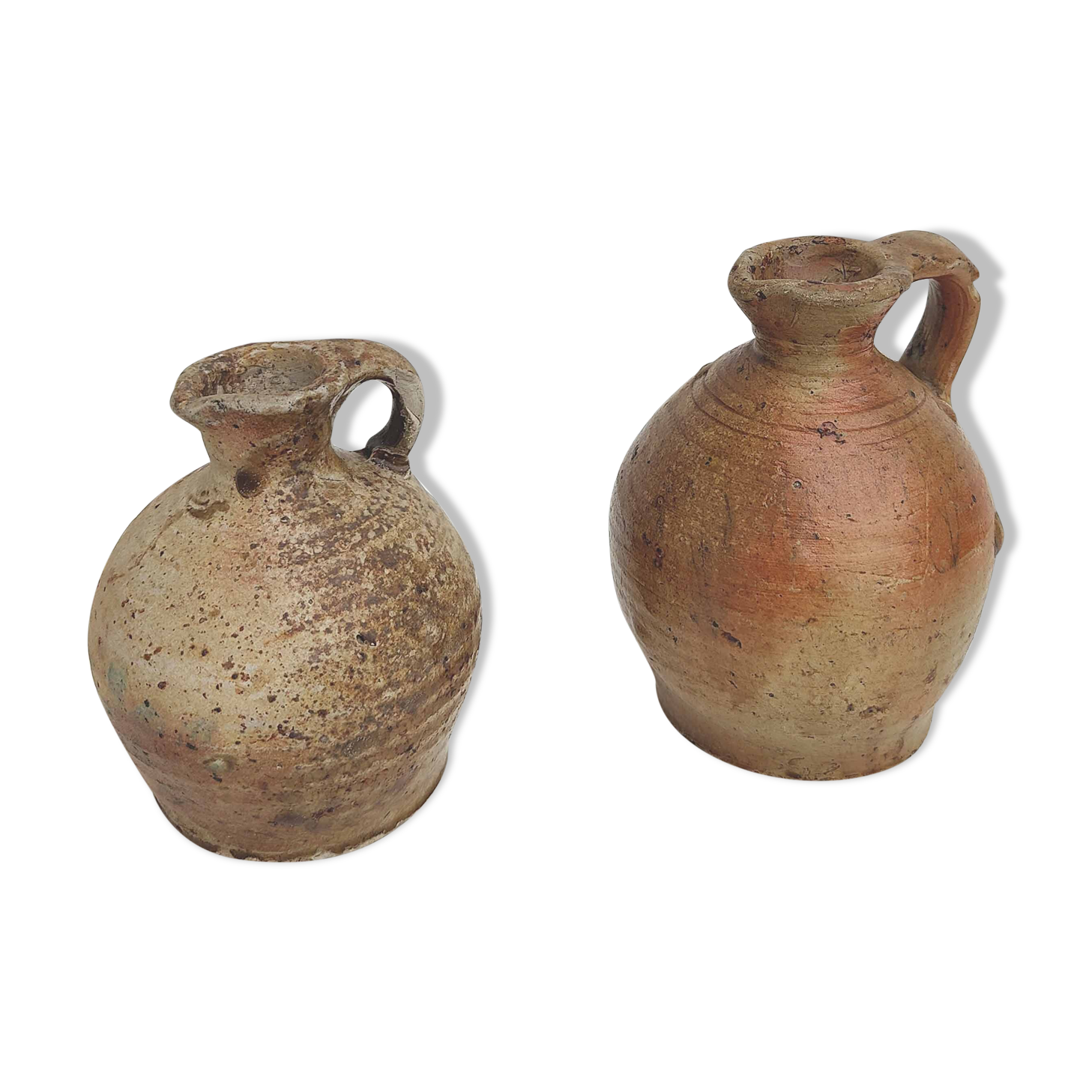 Set of two small sandstone pitchers