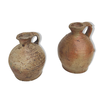 Set of two small sandstone pitchers