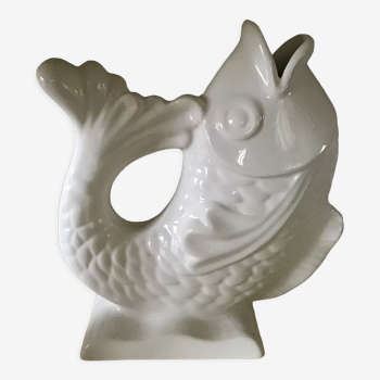 White ceramic vase in the shape of fish