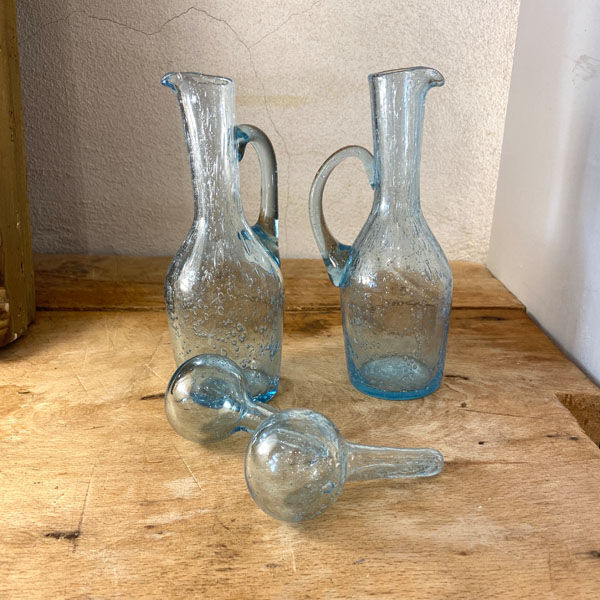Pair of blue bubbled blown glass decanters