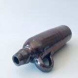Ancient bottle with handle
