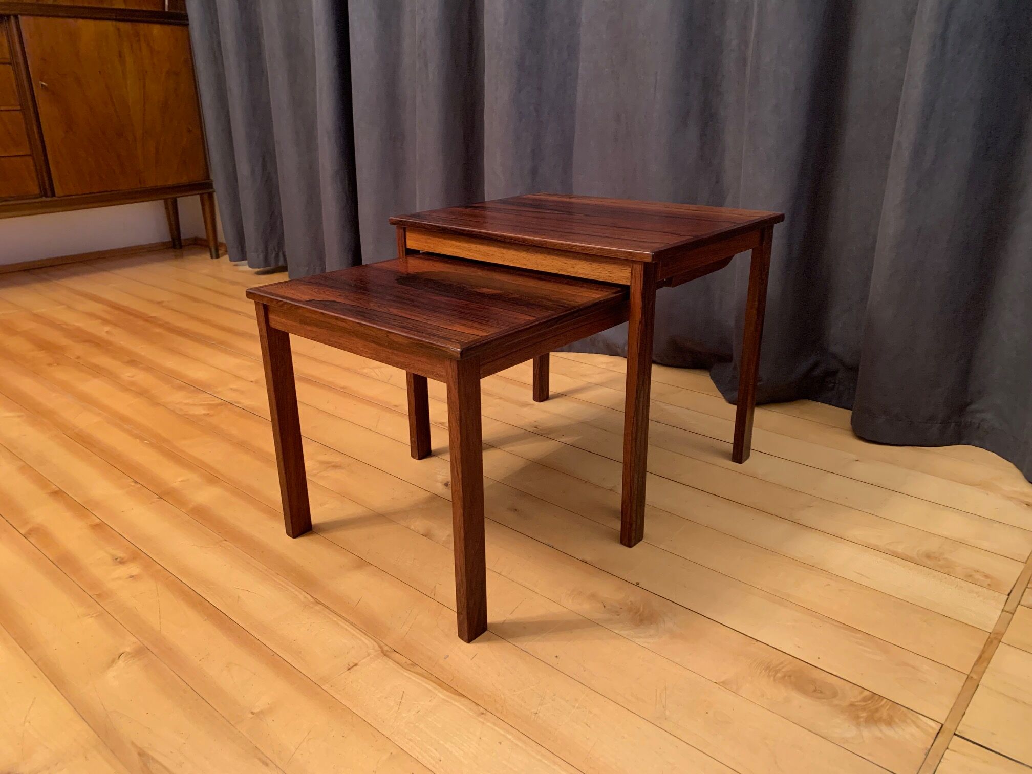 A pair of Kvalitet Form Funktion rosewood side tables Denmark 1960s