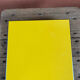 Dessous de plat en formica jaune vintage
