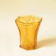 Vintage Art Deco vase in amber yellow cut glass with geometric design.