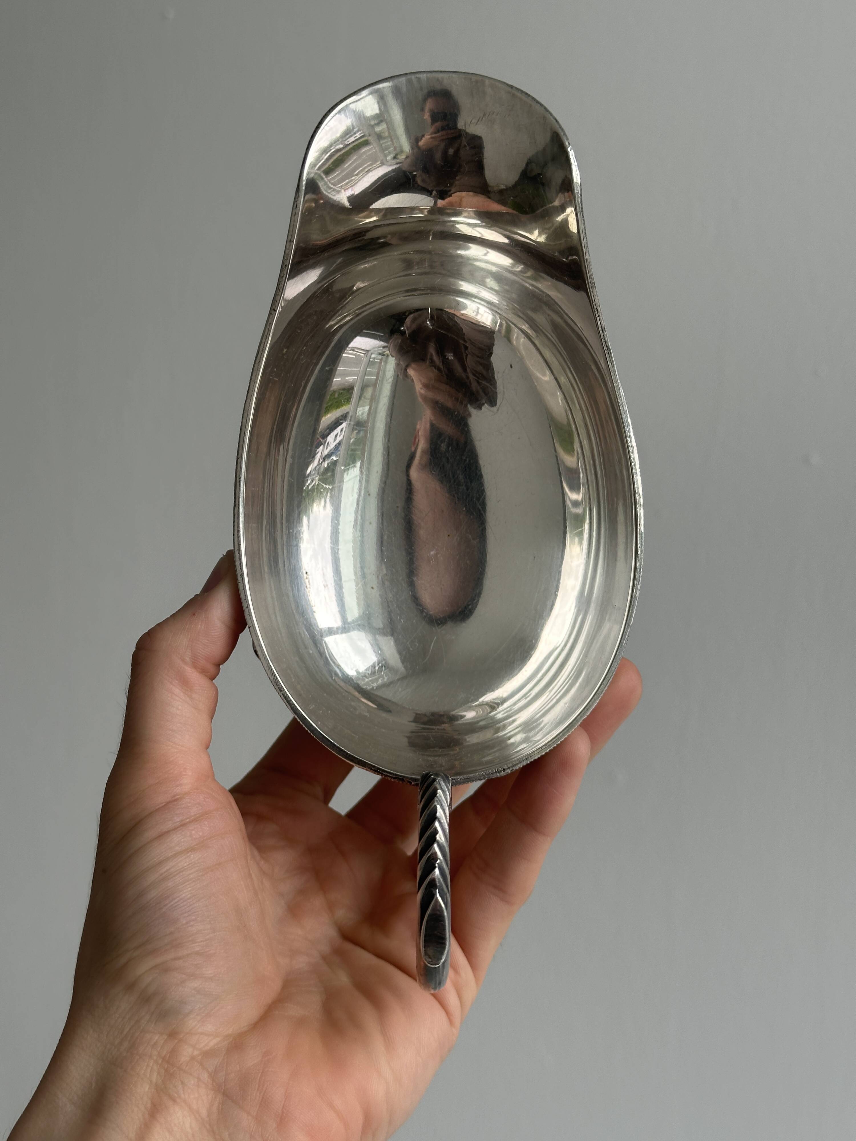 Antique silver-plated sauceboat