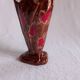 Ceramic vase, brown background, decorated with stylized tulips