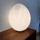 Two opal glass egg lamps