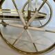 Italian oval rolling table in brass and lacquered wood.