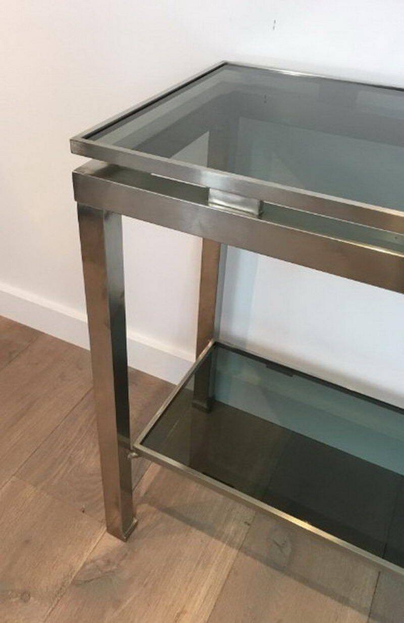 Beautiful console table in brushed metal with bluish glass shelves