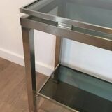 Beautiful console table in brushed metal with bluish glass shelves