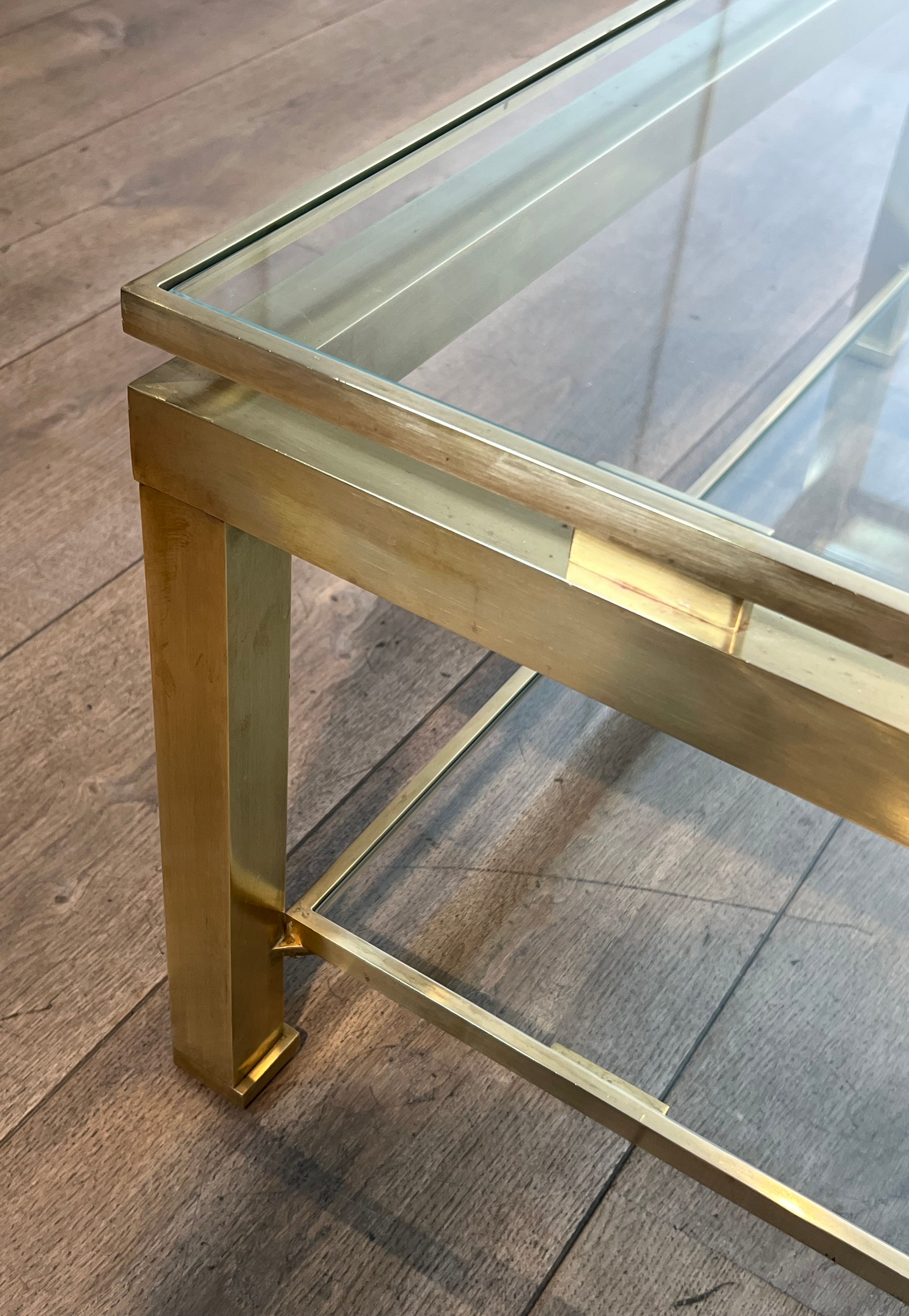 Modernist coffee table in brass and glass tops by Guy Lefèvre for Maison Jansen.