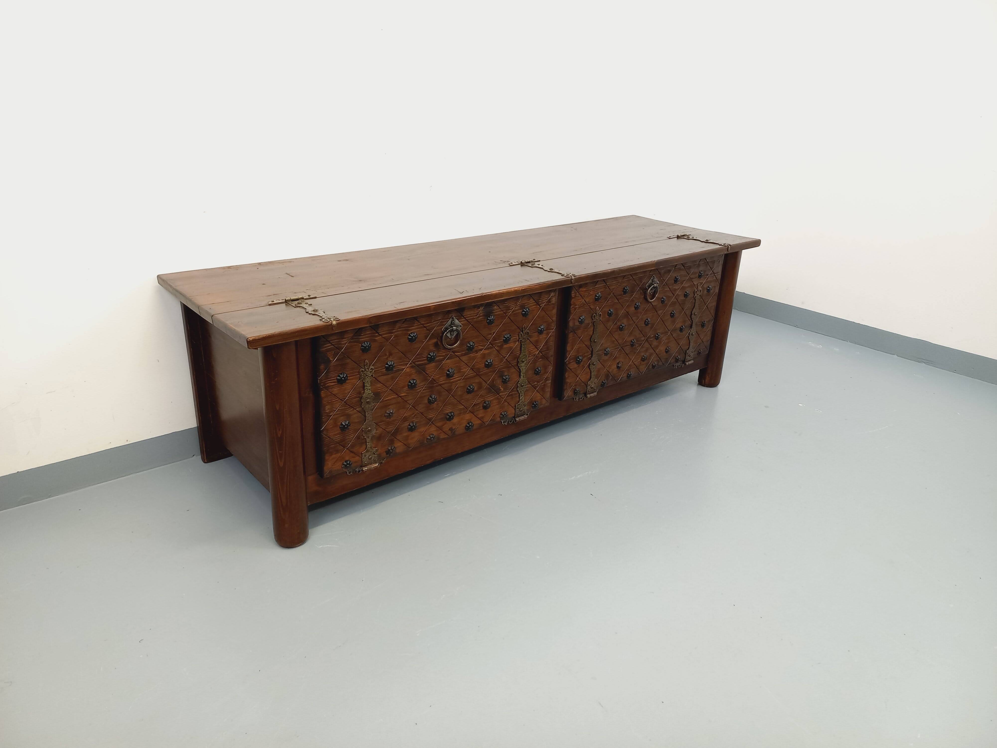 Low brutalist enfilade by Georges Robert in dark pine from the 1960s.