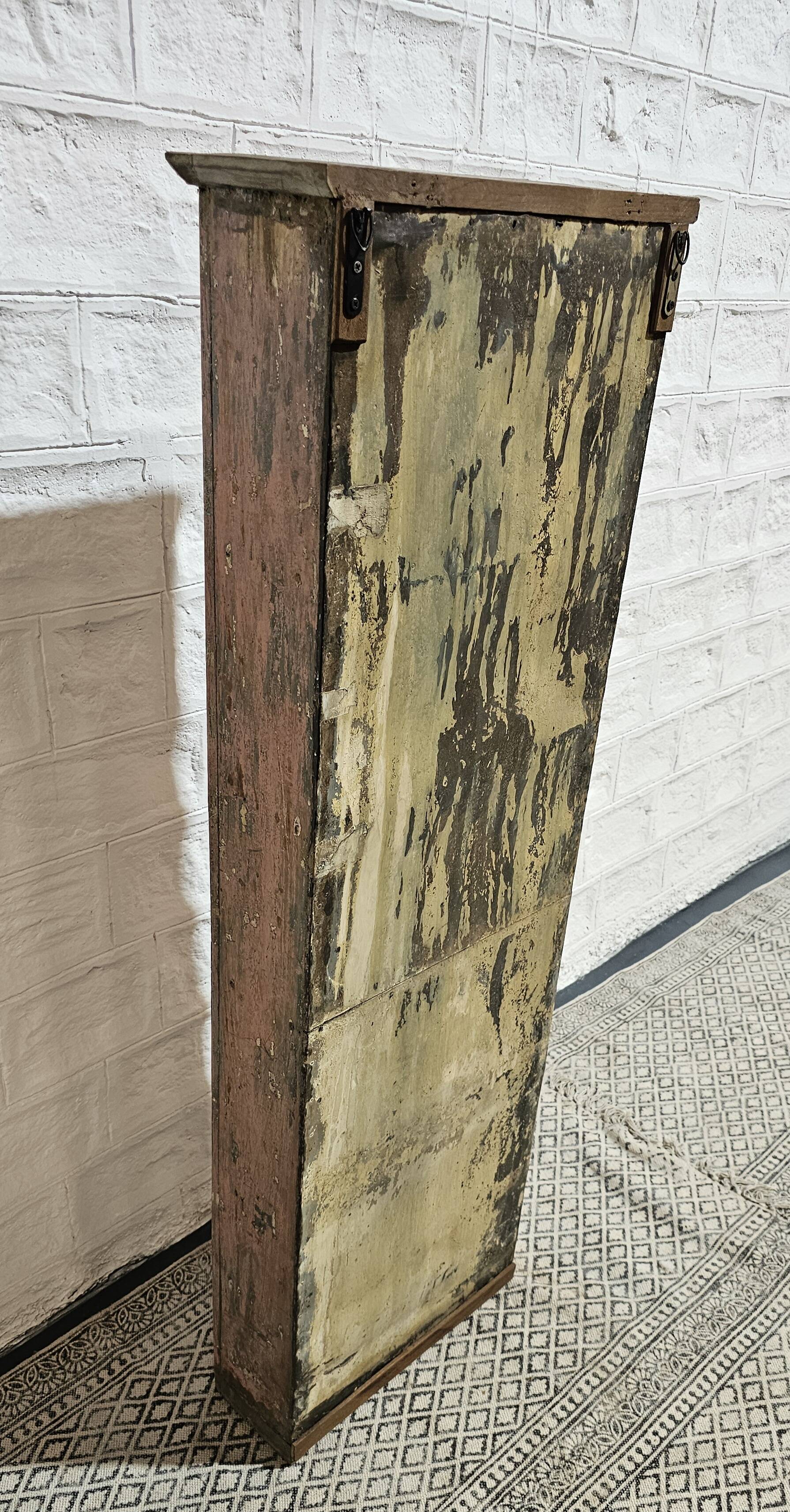 Pink showcase in Burmese teak