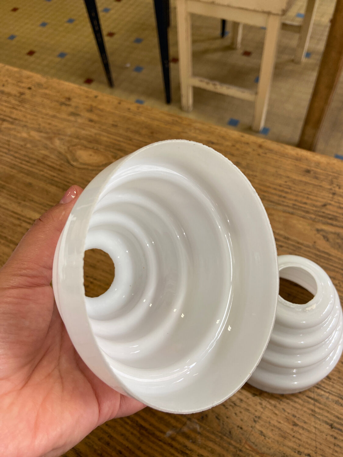 Pair of white glass pendant lights