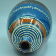 Signed terracotta vase to be identified