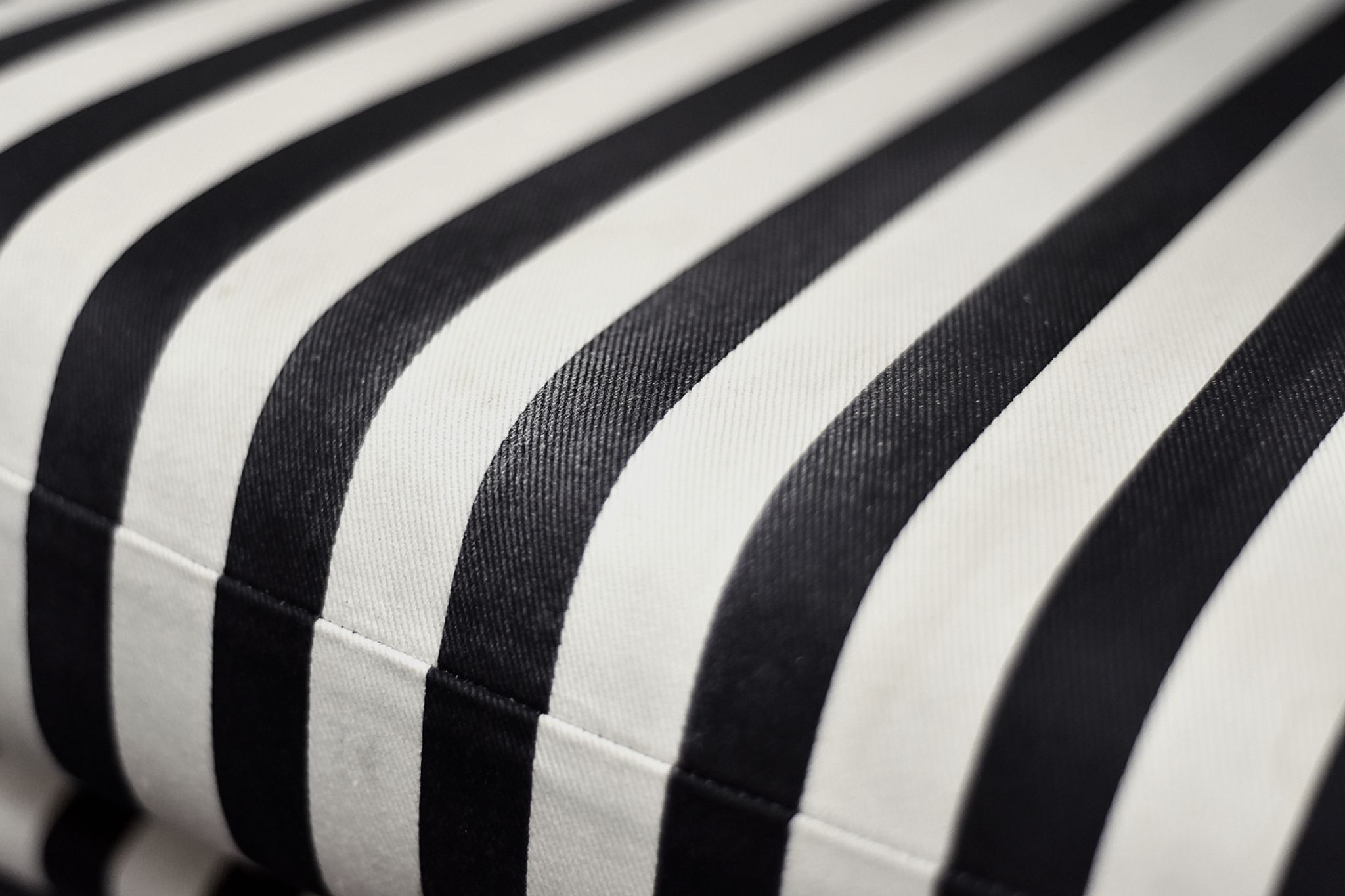 Mid-century modern Scandinavian rounded armchairs with black and white stripes, 1960s.