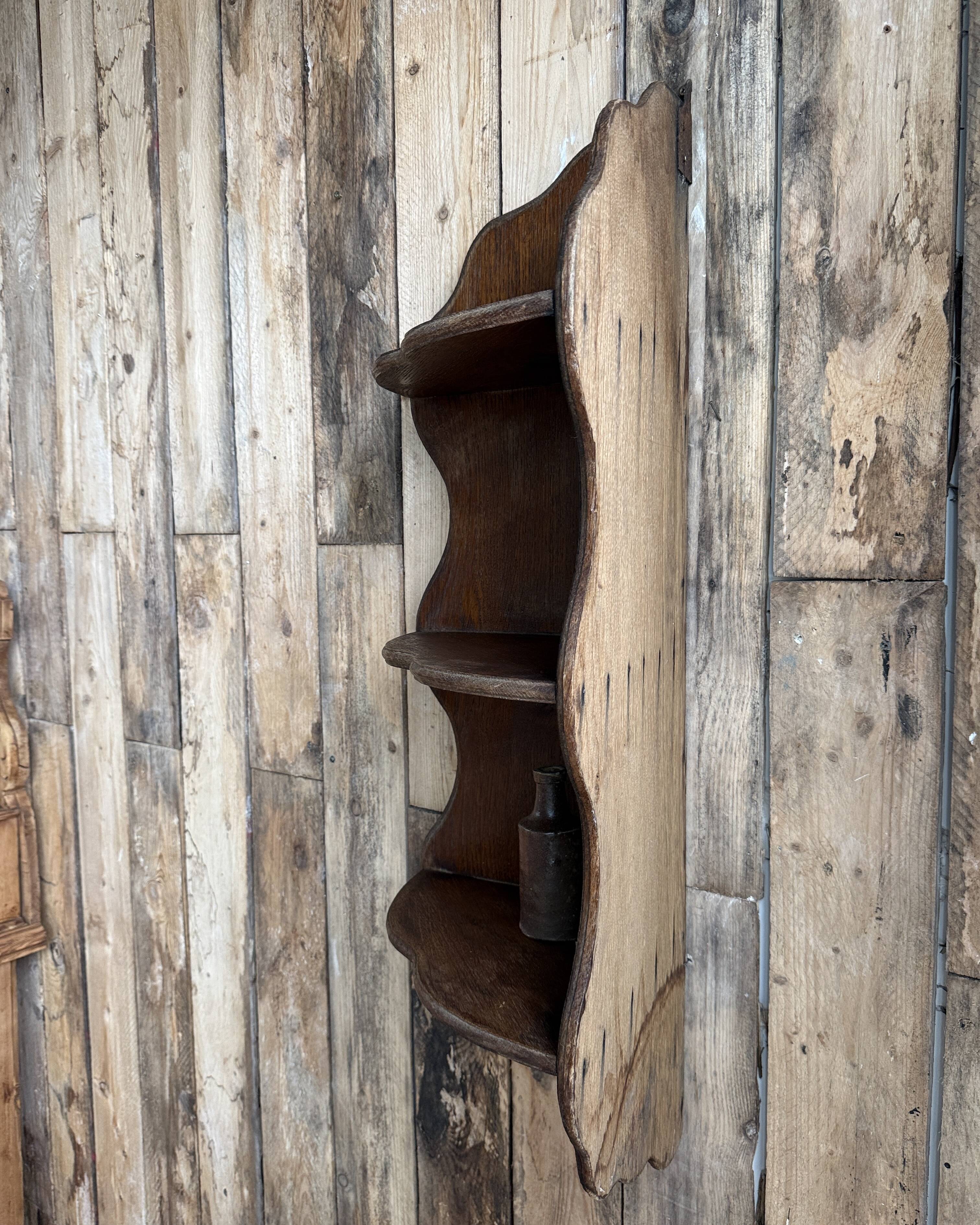 Old corner shelf in solid oak
