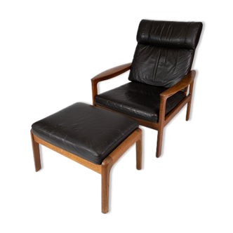 Fauteuil avec repose-pieds en teck rembourré en cuir noir design Arne Wahl Iversen