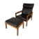Easy chair with stool in teak upholstered with black leather design Arne Wahl Iversen