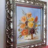 Ancienne huile sur toile signée motif fleurs très bel encadrement argenté