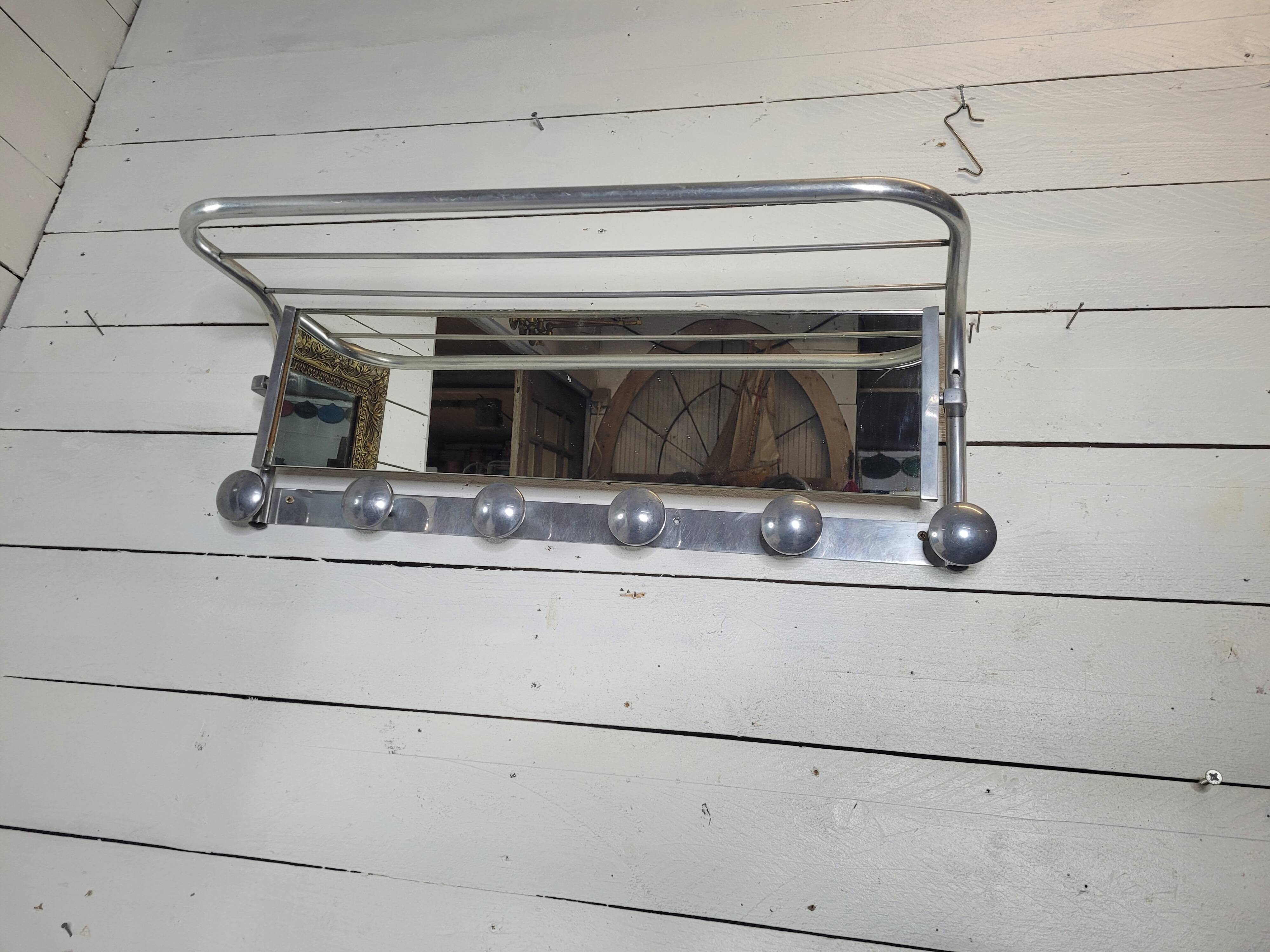 Aluminum wall coat rack with pivoting mirror from the 60s
