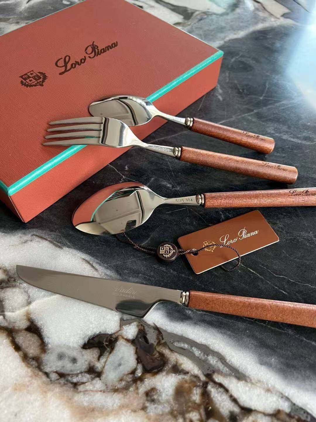 Loro Piana 4-piece mahogany knife and fork set