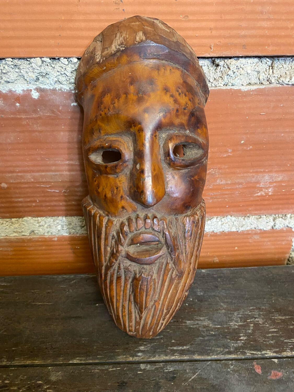 Moroccan mask in carved wood vintage decoration