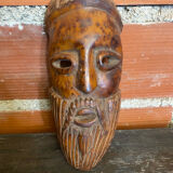 Moroccan mask in carved wood vintage decoration