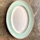 Luneville oval dish in water-green and golden opaque porcelain