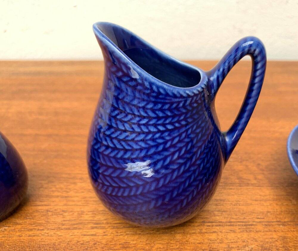 Swedish Salier Mid-Century Bla Eld, Salt Shaker, Milk Jug, Saucer and Plate by Hertha Bengtson for Rörstrand, 1960s, Set of 4