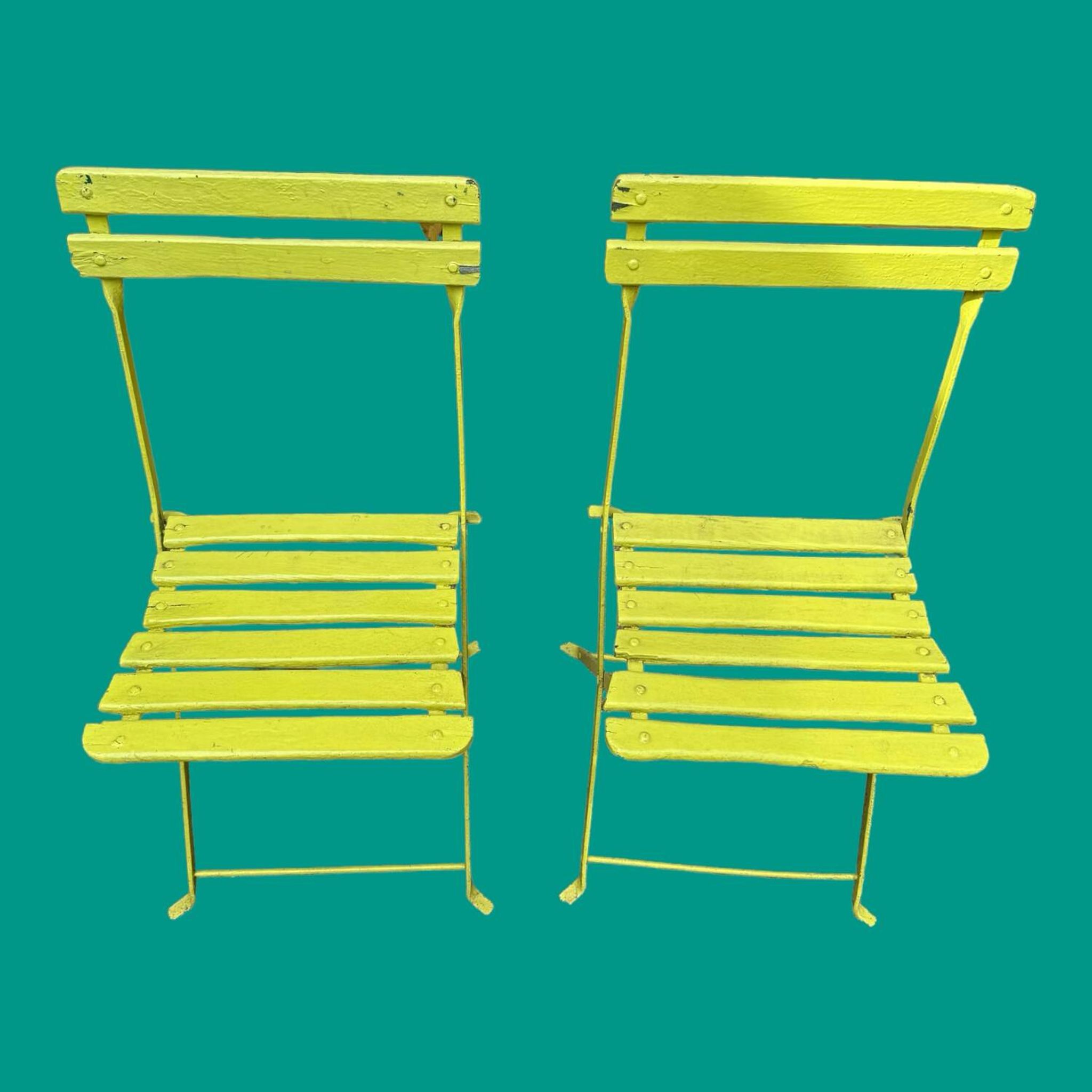 Deux chaises de jardin anciennes pliantes