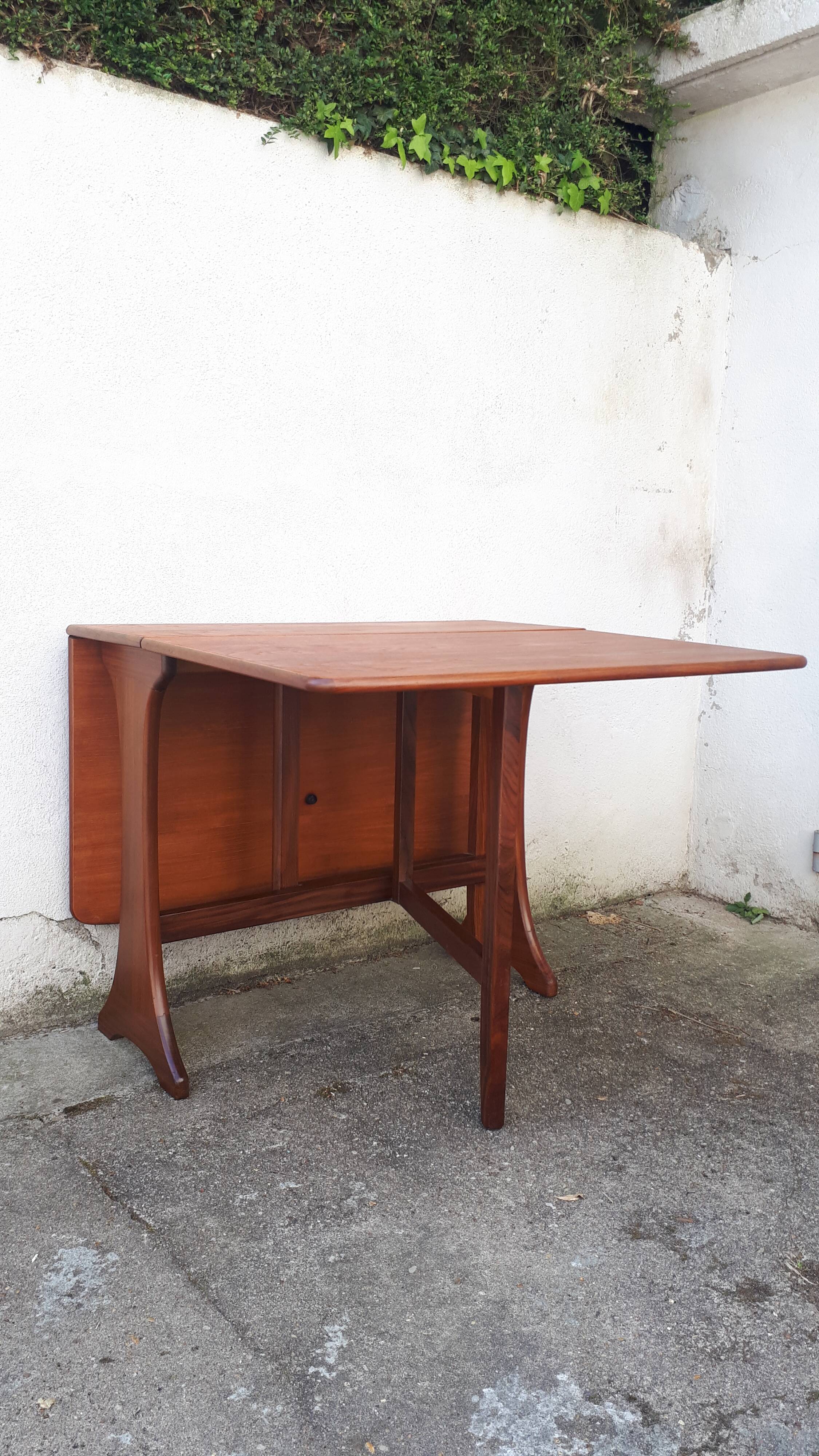 Vintage dining table console desk in teak and exotic wood from the 70s