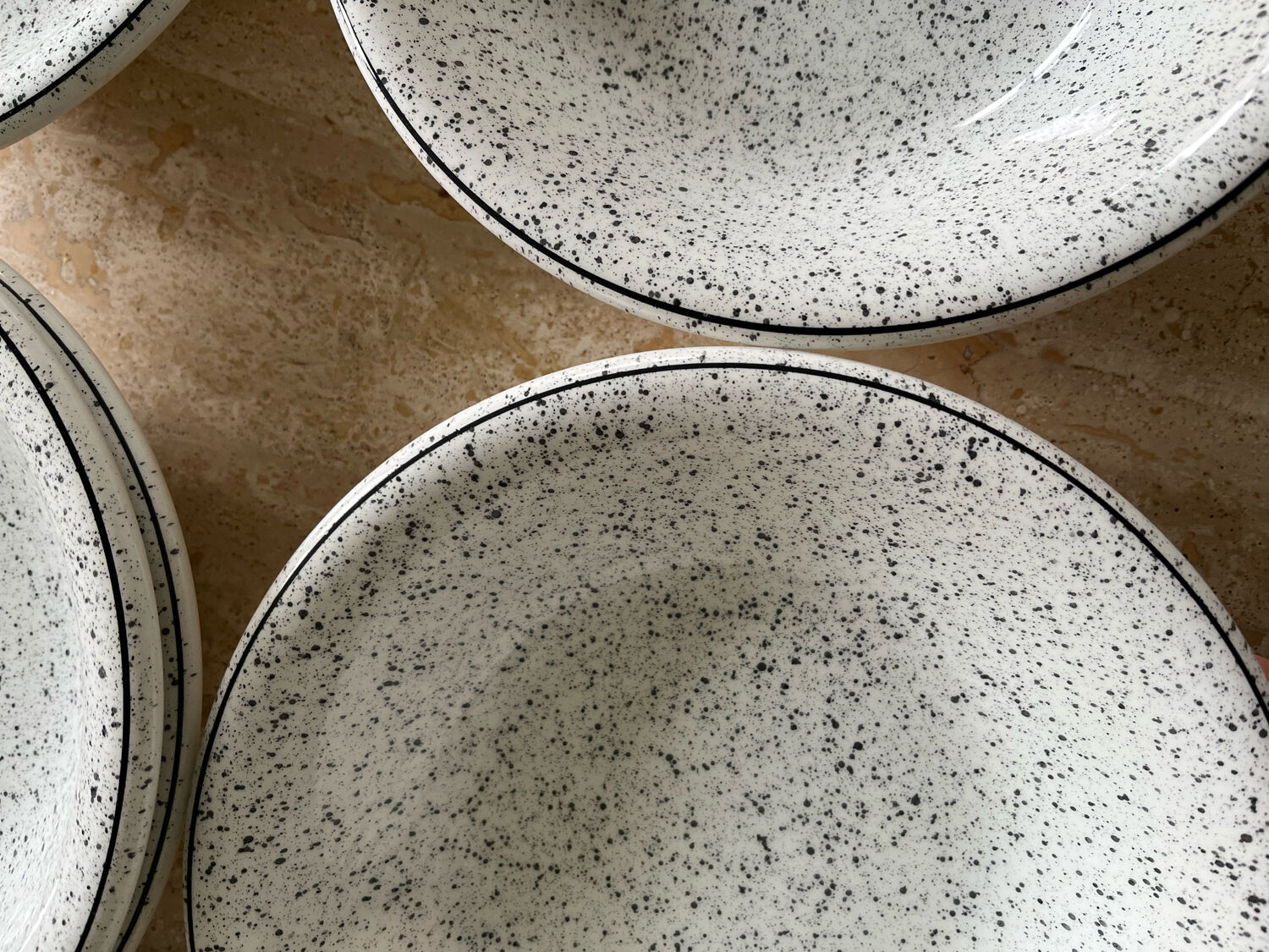 5 hollow plates in hand-speckled Italian ceramic