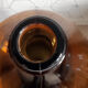 Great old demijohn in amber glass