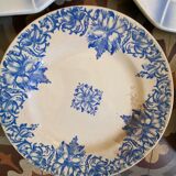 7 matching dessert plates in red green and blue.