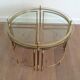 Round brass coffee table in neoclassical style
