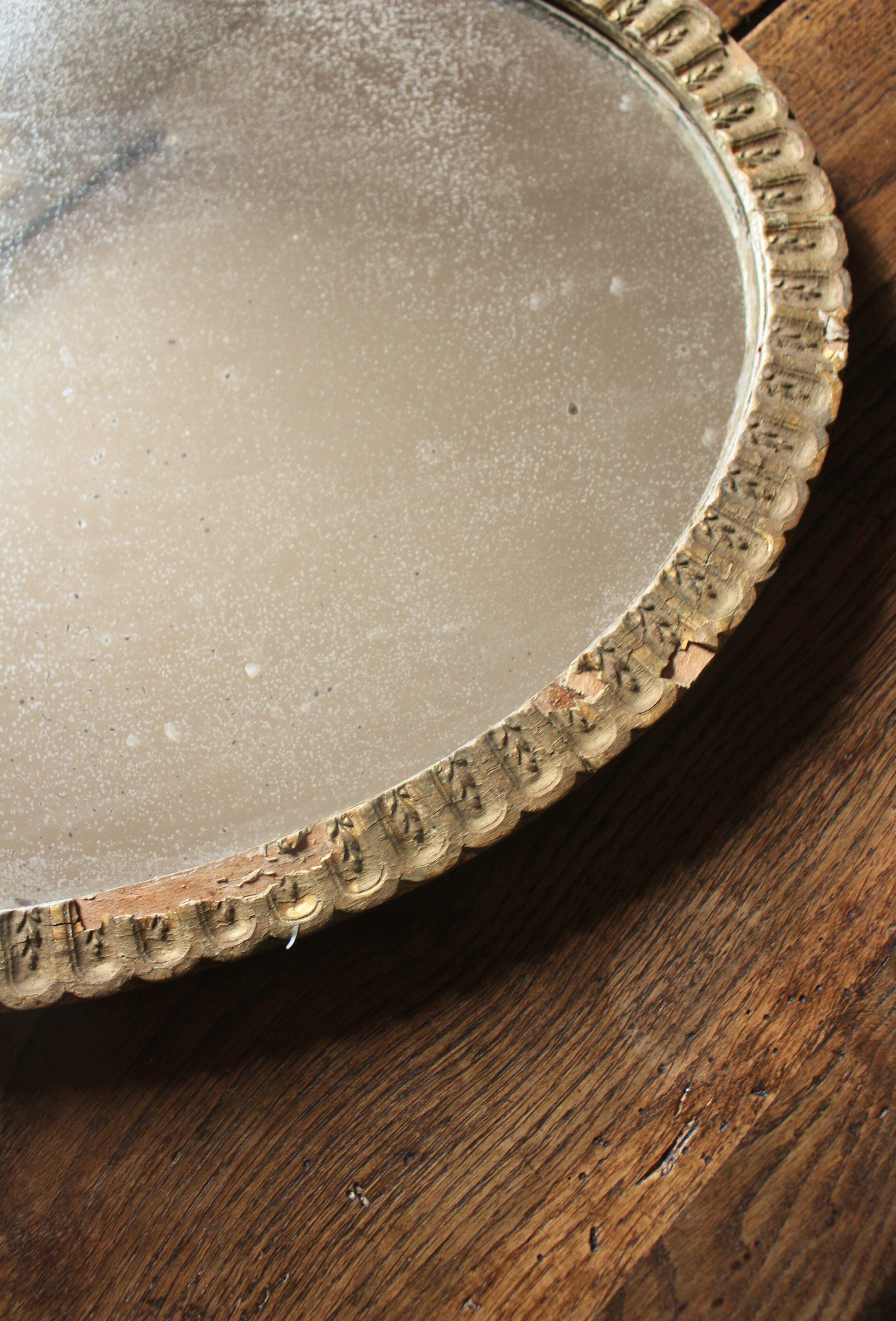 Old oval mirror gilded wood mercurized