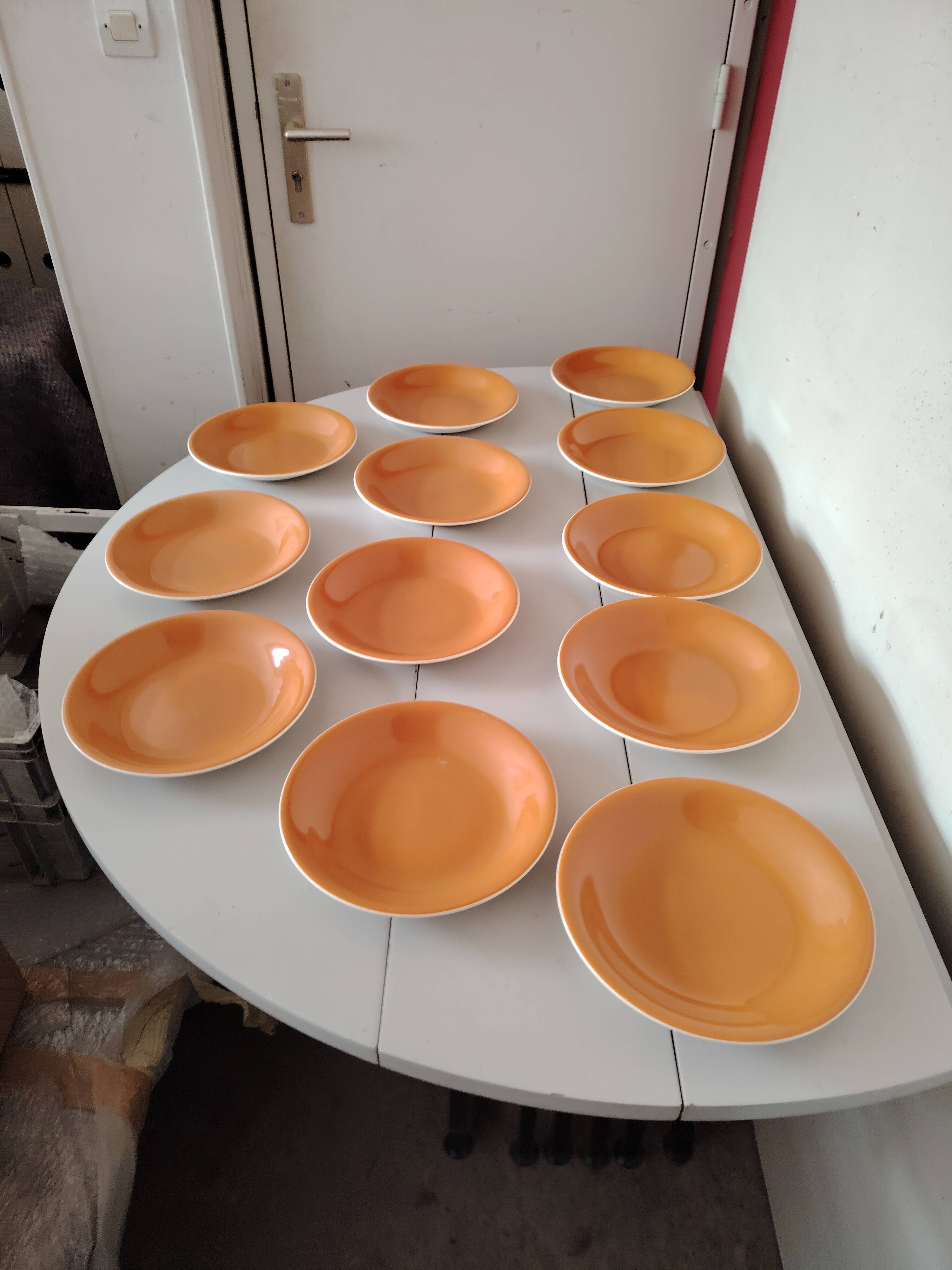 Orange dinner service from Salins
