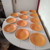 Orange dinner service from Salins