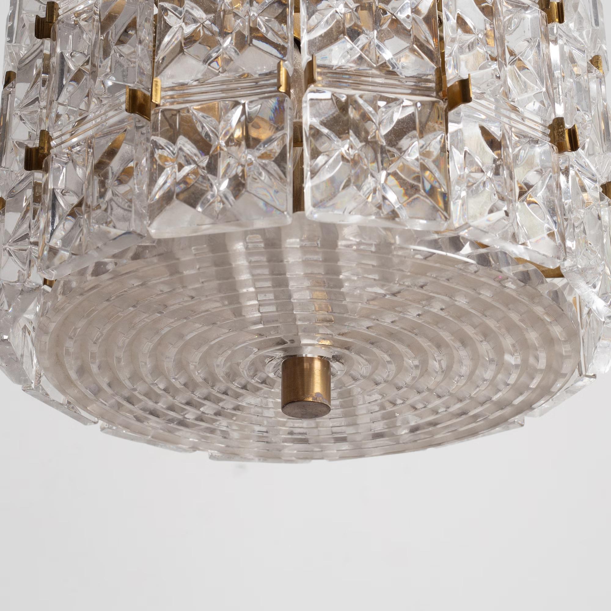 Suspended glass and brass lamp by Carl Fagerlund for Orrefors, Sweden, 1960.
