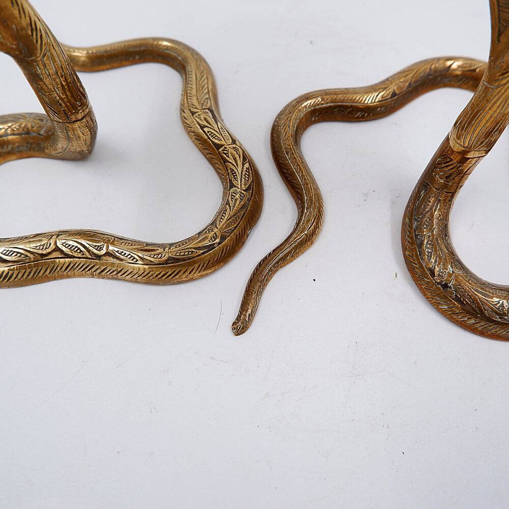 Pair of engraved brass cobra candlesticks - 1960s