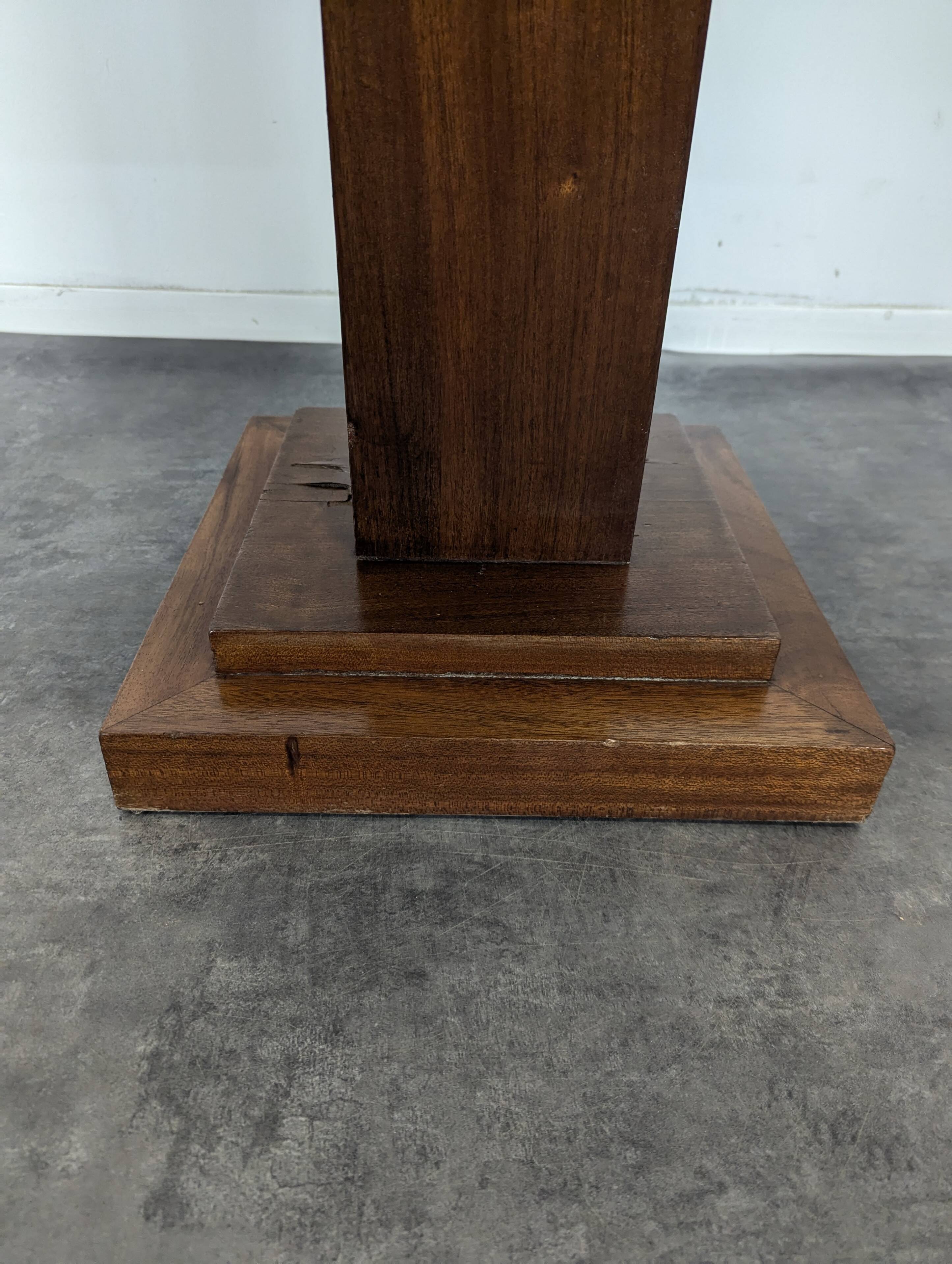Modernist side table in mahogany veneer.