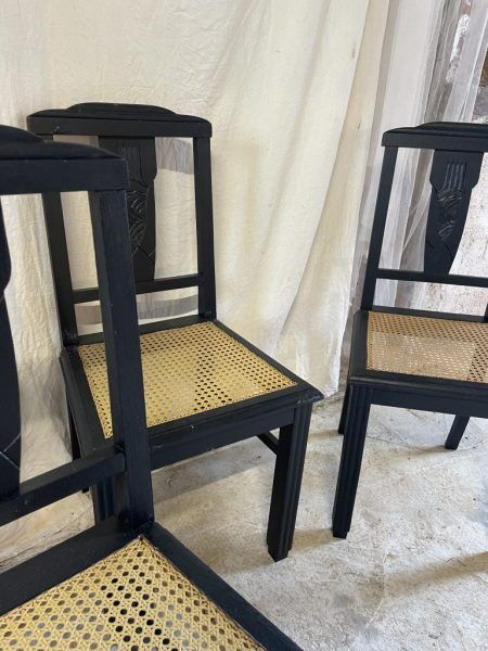 Black chairs and cannage