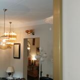 Console set and its mirror, black and gold, 80s