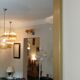 Console set and its mirror, black and gold, 80s