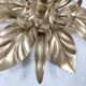 Gold metal flower wall light