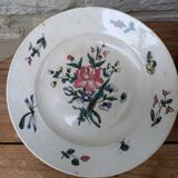 Set of 2 old ceramic plates with flower bouquet patterns