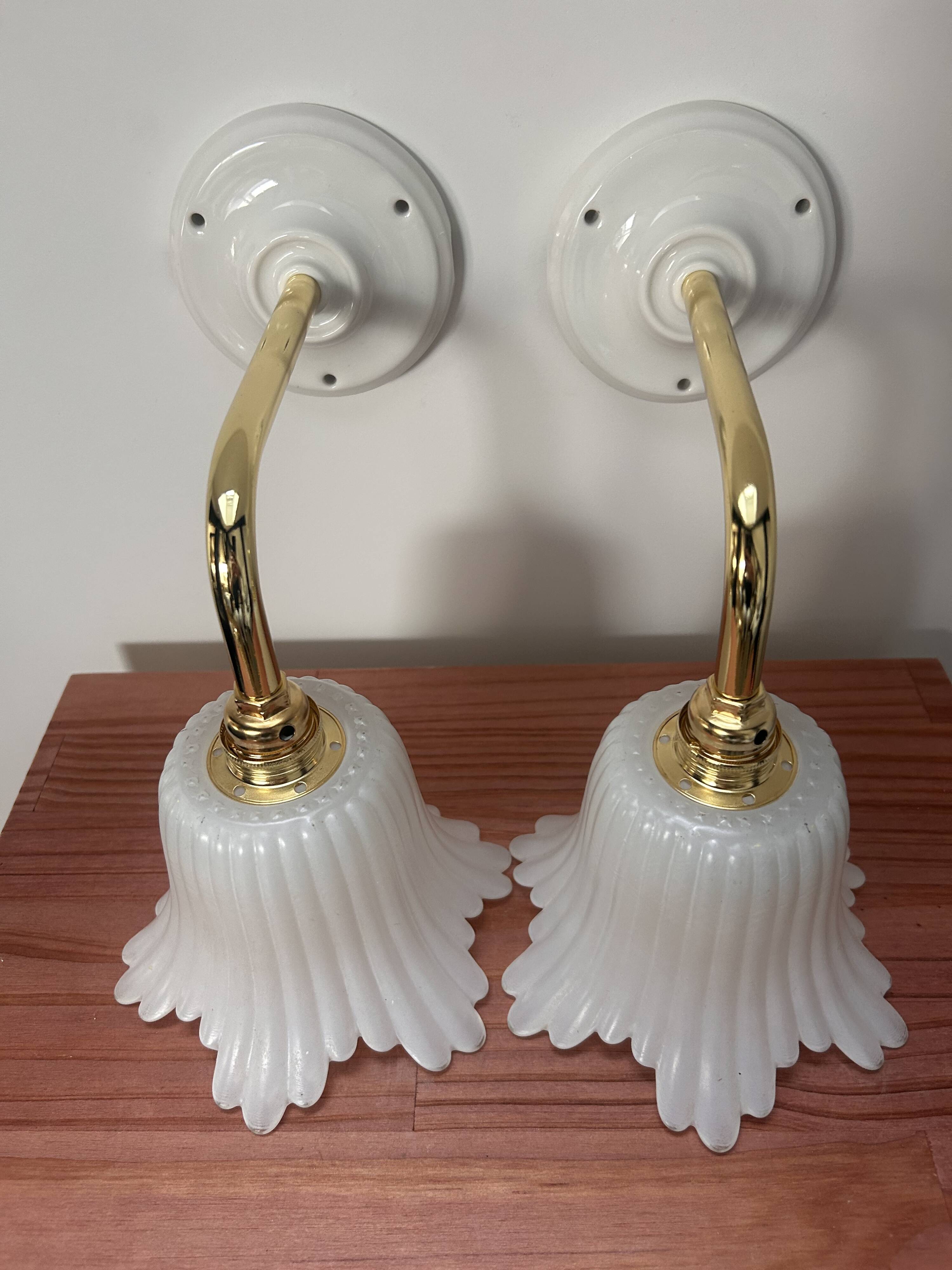Pair of white tulip wall sconces
