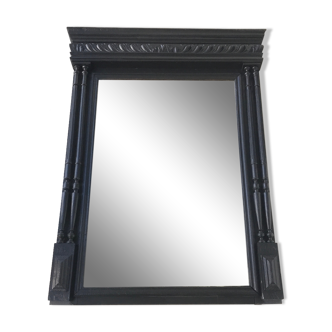 Trumeau with beveled mirror - ornamented black wood frame - nineteenth century